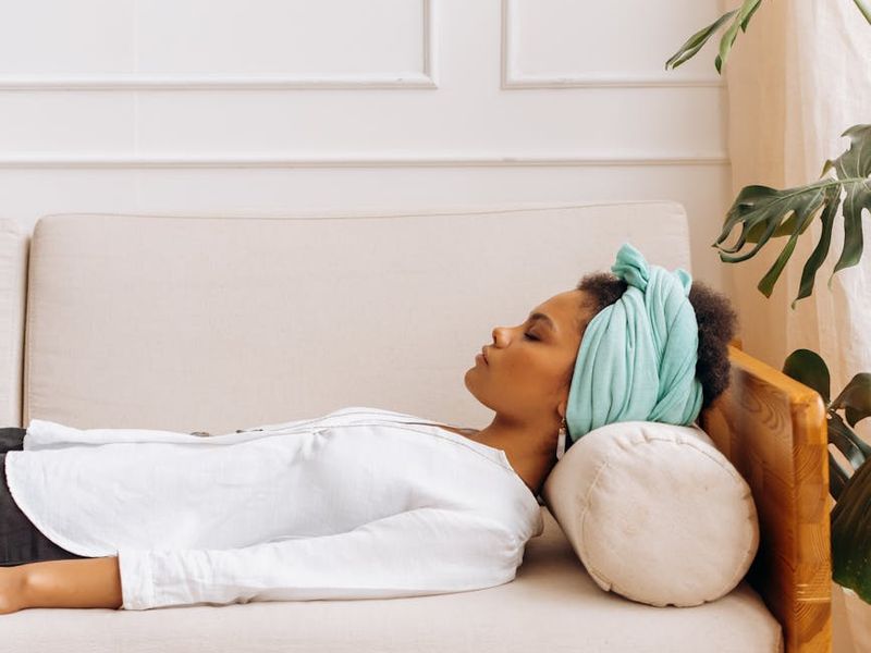 A serene and minimalist space with a yoga mat, suggesting a calm atmosphere.